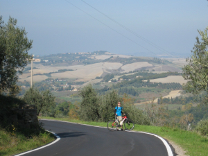 Alonna biking in Volterra